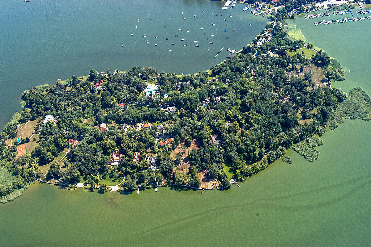 The island Schwanenwerder in the Nikolassee district of Berlin in the borough of Steglitz-Zehlendorf. The island Schwanenwerder in the Havel River at the outlet of the Großer Wannsee Lake